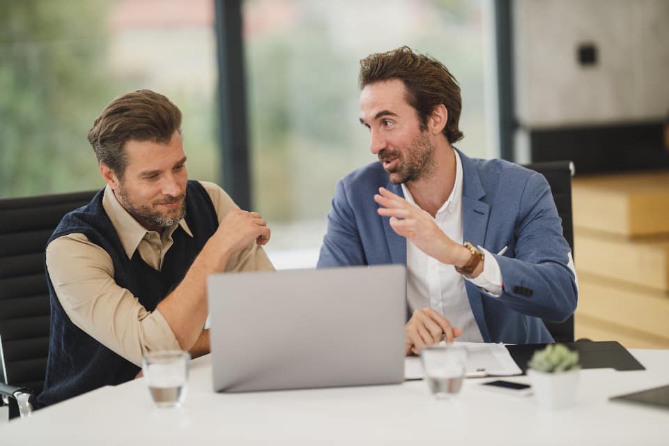 Office worker reviewing an email quarantine folder on screen