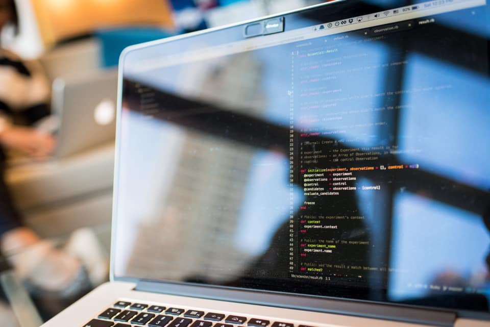 Developer profiling a WordPress site performance report on screen